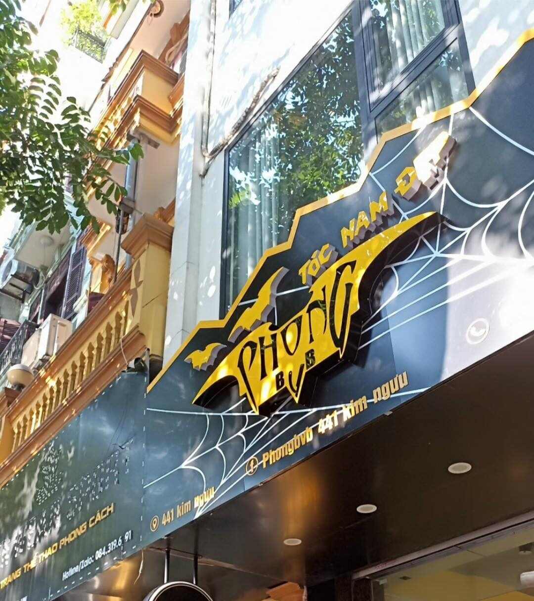 Biển hiệu salon tóc Kim Ngưu